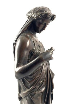 19th Century Bronze Figurine of a Women Draped in Robes on a Circular Zodiac Base
